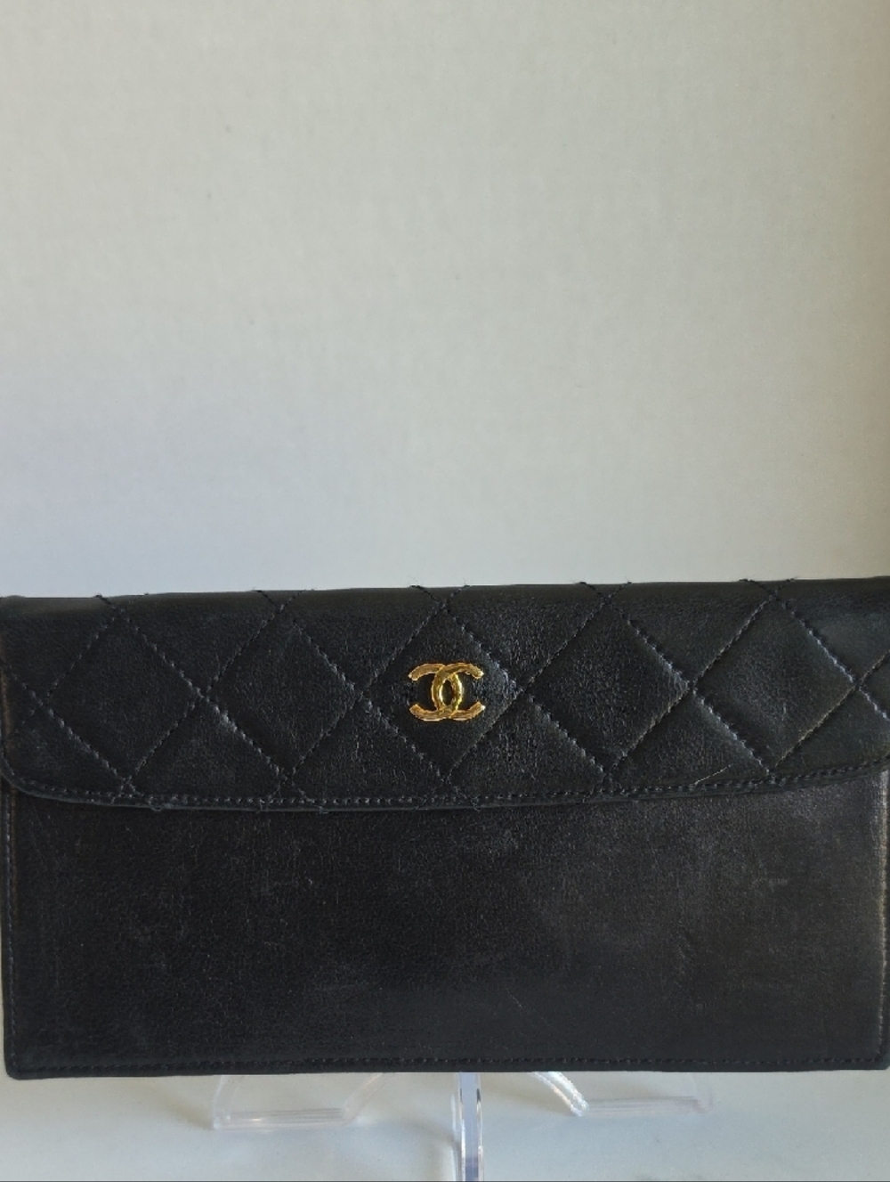 CHANEL Black Quilted Leather Clutch with Gold CC Emblem